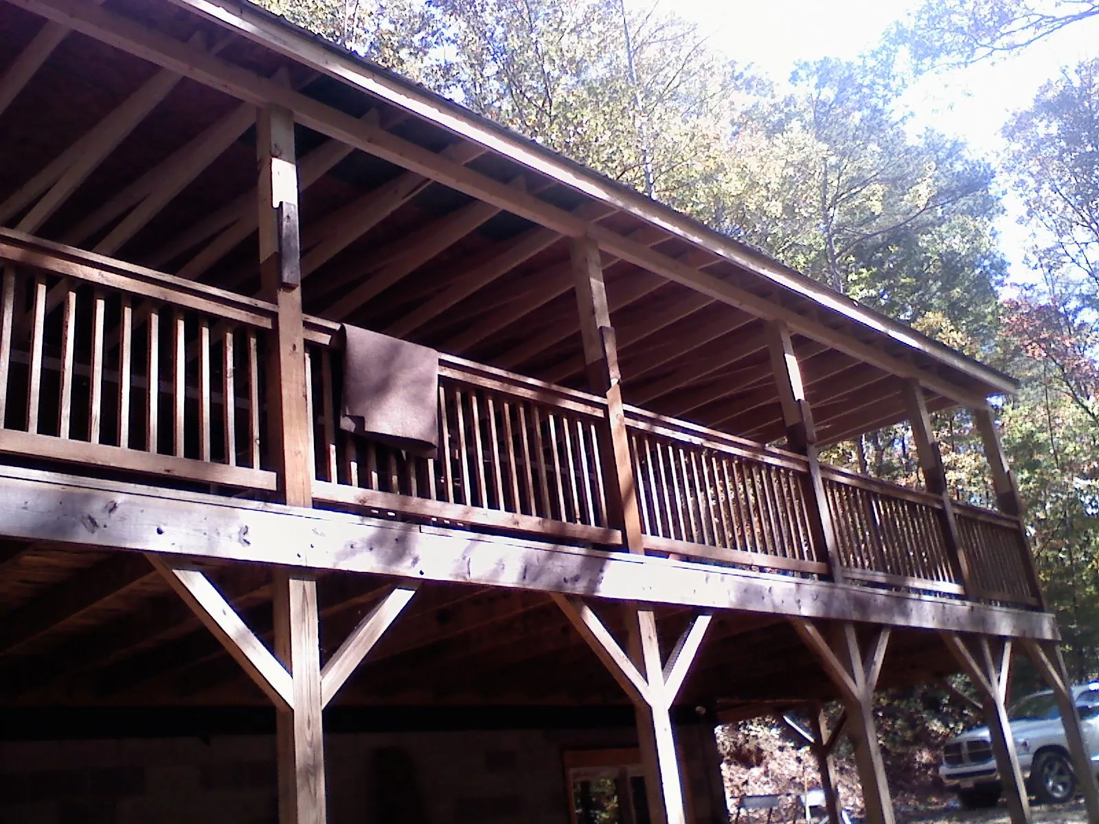 Timber framing under a new elevated porch and deck — Roof Leak Repair in Litchville by Roofing Brothers